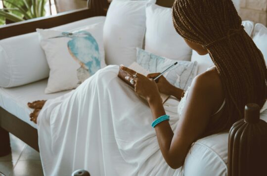 Person reflecting — symbolizing the ease, comfort, and convenience of telehealth.
